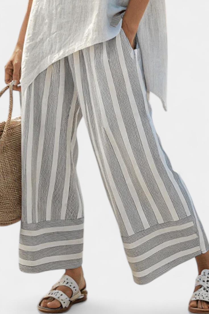 Alina | Completo blusa asimmetrica e pantaloni a righe